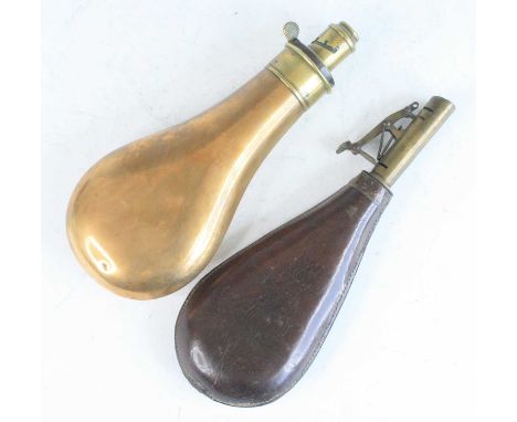 A 19th century copper powder flask, of typical pear shape, the brass nozzle measuring 2 1/4 to 3 drams, stamped G. &amp; J.W.