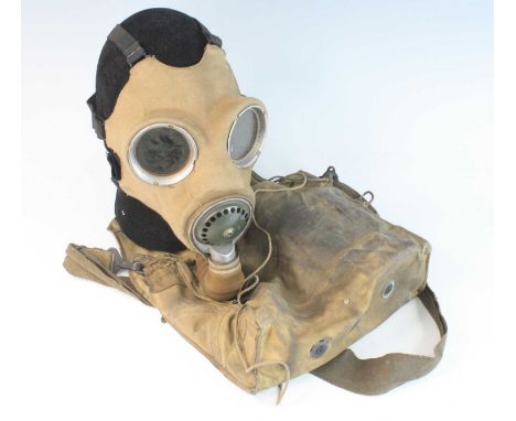 A WW II British Standard Service Respirator, dated 1939, in canvas bag stamped Maple 1939 and hand written Fred Lloyd Upton P