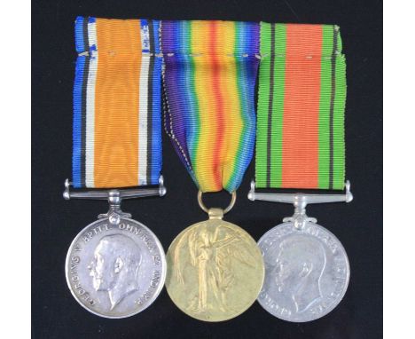 A WW I British War and Victory pair, naming 27814 PTE. A. TIMMS. GLOUC. R., together with a WW II Defence medal. (3)