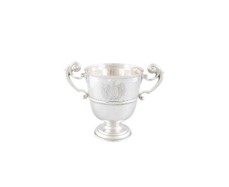 A GEORGE II SILVER TWO HANDLED CUP, DUBLIN C.1746, possibly the mark of Isaac D'oiler, with harp shaped handles, the body wit