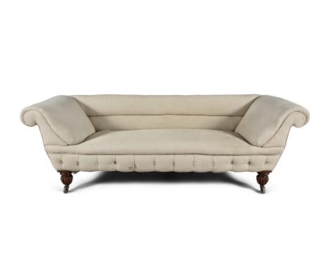 A WILLIAM IV MAHOGANY FRAMED SCROLL END SOFA,covered in beige fabric, raised on fluted short legs and brass castors. 230cm wi