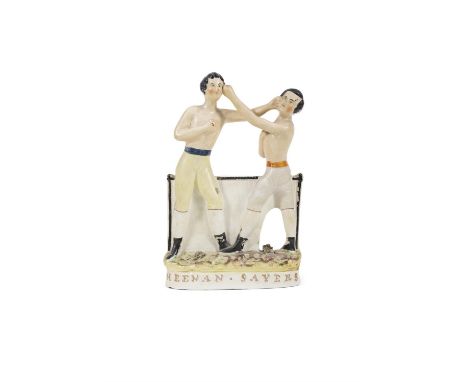 A STAFFORDSHIRE FLAT BACK POTTERY GROUP OF BOXERS JOHN HEENAN AND TOM SAYERS 19th CENTURY, modelled in boxing stance, bare-ch