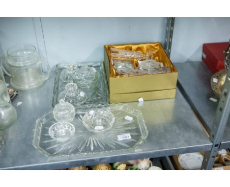 A BOXED CUT GLASS SET INCLUDING; VASES, TRINKET BOX AND COVER AND TWO DRESSING TABLE SETS 