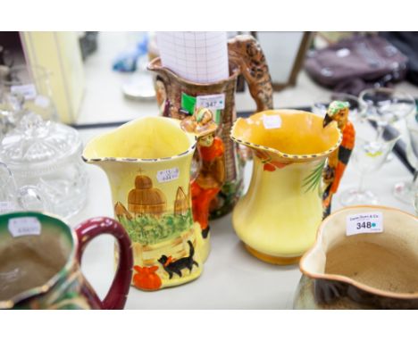 BURLEIGH WARE PARROT HANDLED JUG AND ANOTHER, 'A Reproduction of Old Feeding Time Jug' originally Made by Samuel Alcock' in N