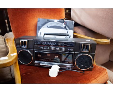 A PANASONIC PORTABLE STEREO SYSTEM AND DC AUTOMATIC 33/45 RECORD PLAYER (2) 