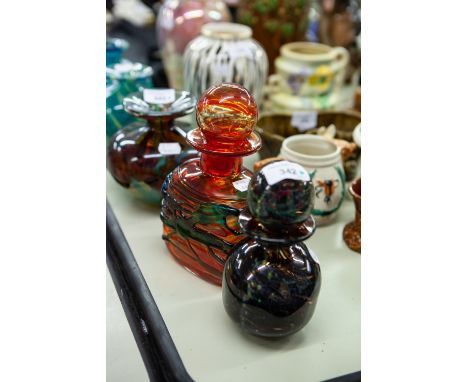 MDINA ORANGE GLASS OBLONG GLASS DECANTER with trailed blue overlaid trailed decoration and globular stopper, 8" high and  a P