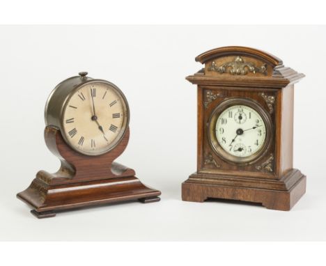 TWO EARLY TWENTIETH CENTURY SPRING DRIVEN SMALL MANTLE/ DRESSING TABLE CLOCKS, one of drum top form in rosewood, 6 ½" (16.5cm