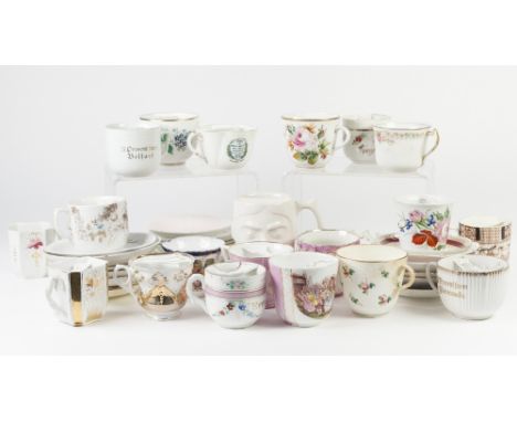 FORTY FOUR VICTORIAN AND LATER CERAMIC MOUSTACHE CUPS, including: Royal Commemorative, Souvenir, floral, and a hand painted c