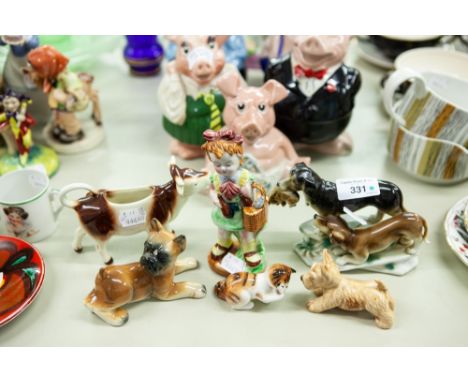 HUMMEL CERAMIC COW CREAMER; ROYAL DOULTON CHINA MODEL OF A KITTEN licking its paw, CONTINENTAL CHINA GROUP OF TWO DOGS, one w