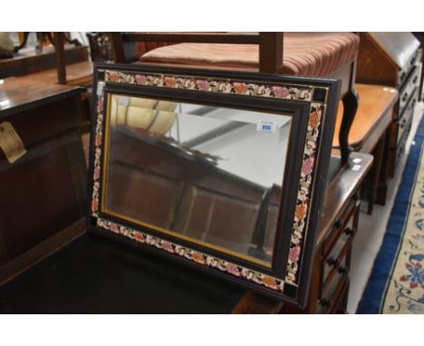 A vintage mirror having ceramic tile surround, possibly a Crown Derby pattern, approx. 54 x 39cm