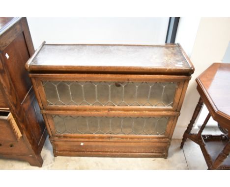 A Globe Wernicke style two tier oak bookcase, the measuements are as follows; H 80cm x W 87cm.