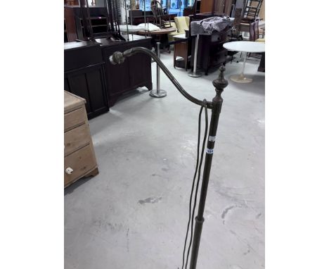 A vintage style brass standard lamp
