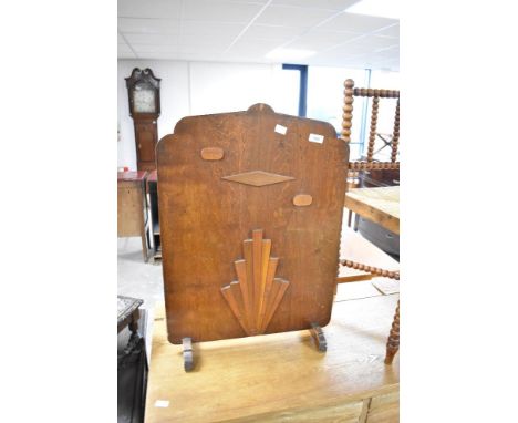An Art Deco style ply fire screen