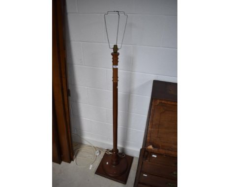 A traditional mahogany standard lamp