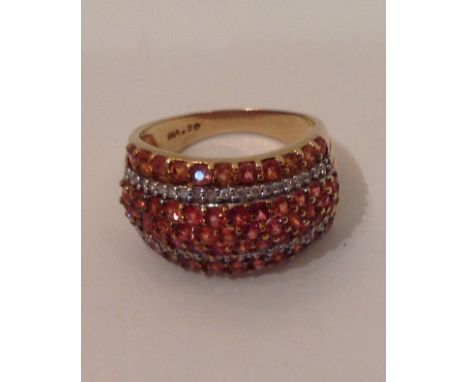 A SHERRY TOPAZ AND DIAMOND SET YELLOW METAL DRESS RING Size P. (569)