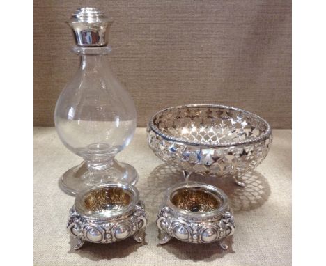 A 20TH CENTURY HALLMARKED SILVER PIERCED DISH  Birmingham, 1922, supported on tripod legs, together with a pair of Continenta