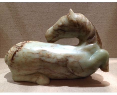 A LARGE 19TH/20TH CENTURY JADE CARVING  Of a horse. (31cm x 21cm)