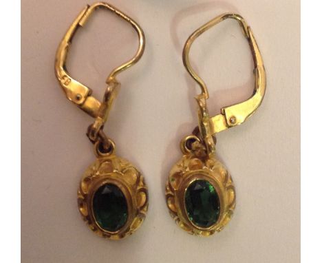 AN ANTIQUE YELLOW METAL MOURNING RING  Dated 1753, together with a pair of yellow metal pendant earrings, size N. Condition: 