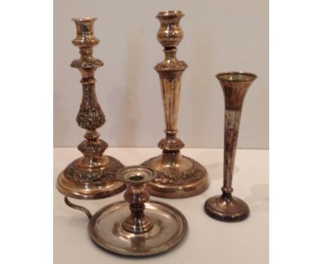 TWO LATE 19TH/EARLY 20TH CENTURY SHEFFIELD PLATE CANDLESTICKS  Embossed with scrolling leaves, raised on circular bases, toge