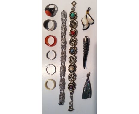 A SELECTION OF COSTUME JEWELLERY  Including a miracle bracelet, a tortoiseshell and mother of pearl pendant, abalone, coral e