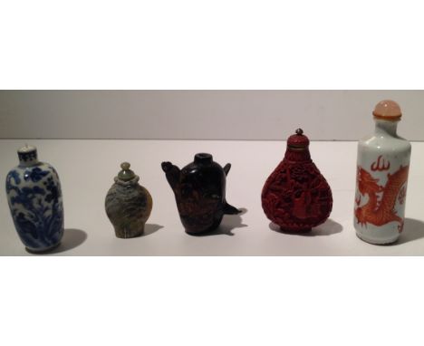 A GROUP OF FIVE SNUFF BOTTLES/SCENT FLASKS Including cinnabar with gilt metal mounts and jade. (tallest 8½cm)