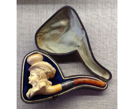 BEAULIEU TOBACCO CO., A VICTORIAN MEERSCHAUM PIPE  Finely carved with the head and shoulders of a lady wearing a bonnet, ambe