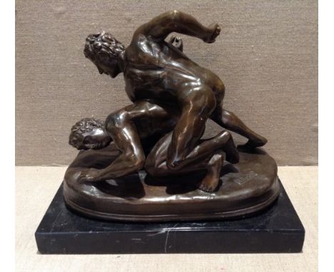 A 20TH CENTURY BRONZE SCULPTURE  Of Greco/Roman wrestlers, signed 'C.P. Tupton' and mounted on a black marble base. (approx 2