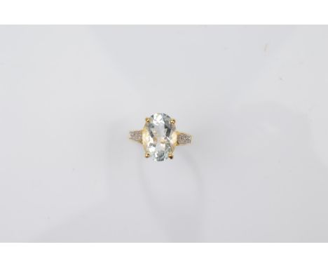 A certificated 18ct gold aquamarine and diamond dress ring, the oval mixed cut claw set aquamarine weighing 3.9ct, with eight