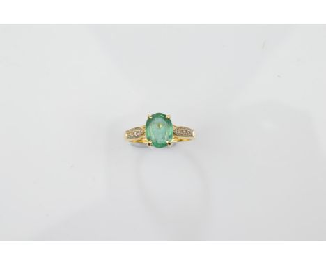 A certificated 18ct gold Siberian emerald and diamond dress ring, the oval claw set emerald with diamond set shoulders on a y