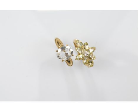 Two 9ct gold certificated beryl dress rings, including a heliodor white topaz cluster ring, ring size N, and a mixed oval cut