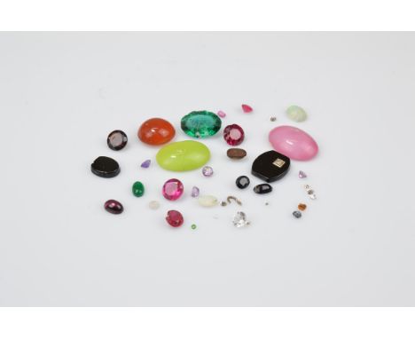 A small collection of loose gem stones, including precious opal, onyx and diamond barrel cut tablet, various paste, garnet an