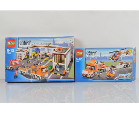 Two boxed Lego City models, including Helicopter Transporter 7686 opened with manual and unchecked and City Garage 7642 opene