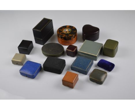 A quantity of tooled leather jewellery boxes, for rings, broches, portrait miniatures together with a leather heart shaped ex