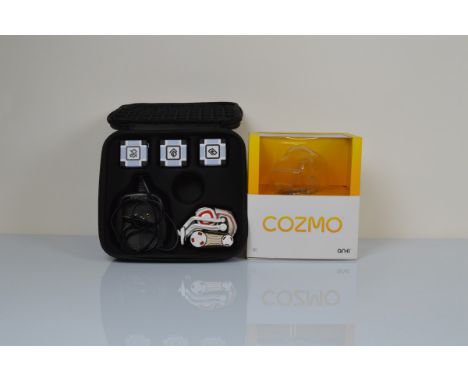An Anki Cozmo desktop robot in carry case, in gold, white and red, with original box 