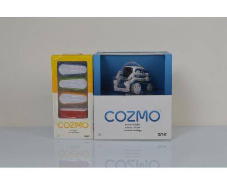 A boxed Anki Cozmo limited edition desktop robot, in blue and white, unopened together with a Cozmo tread pack 