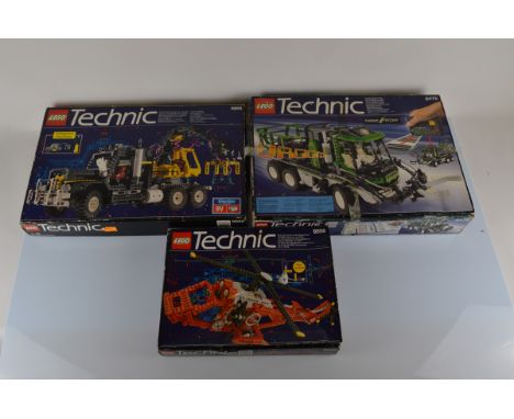 Three boxed Lego Technic models, Helicopter 8856, lacking manual, JCB Transporter 8868 and Barcode Truck 8479, all opened and