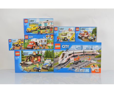 Seven boxed Lego City models, including High Speed Passenger Train 60051 unopened, Pickup and Caravan 60182 unopened but with