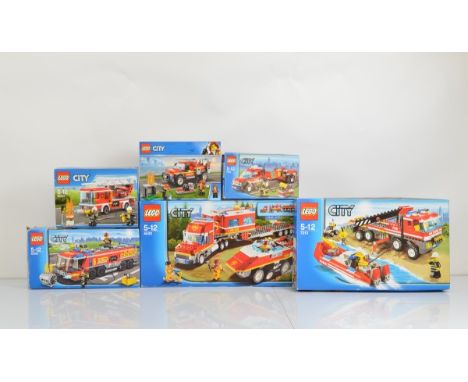 Six boxed Lego City models, including Off Road Fire Truck and Fire Boat 7213 opened with manual and unchecked, Fire Transport