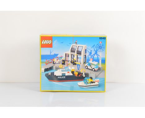 A boxed Lego Pier Police Set, 6540, opened with manual , unchecked 