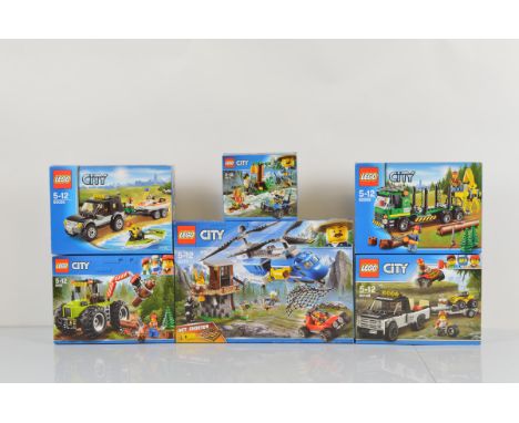 Six boxed Lego City models, including Mountain Arrest 60173 unopened, ATV Race Team 60148 unopened, Forest Tractor 60181 unop
