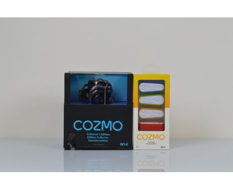 A boxed Anki Cozmo limited edition liquid metal desktop robot, together with a Cozmo boxed tread pack 