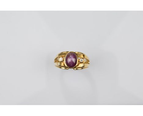 A certificated 9ct gold star ruby and white sapphire gentleman's dress ring, the central cabochon ruby in rubbed over setting