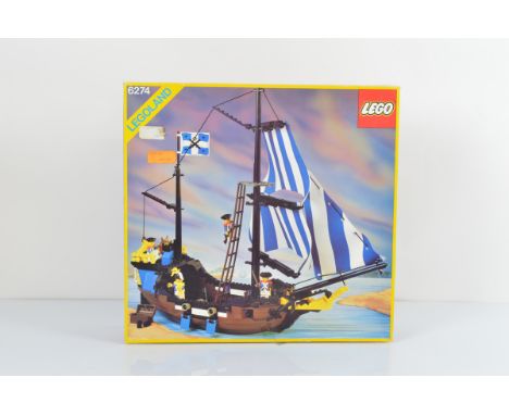 A boxed Lego Caribbean Clipper, 6274, opened and unchecked with manual  and four mini figures 