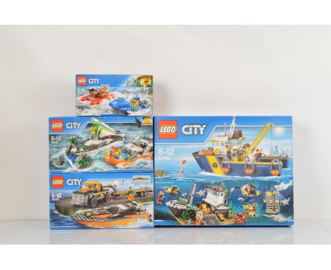 Four boxed Lego City models, including Deep Sea Exploration Vessel 60095 opened with manual unchecked some original polybags 