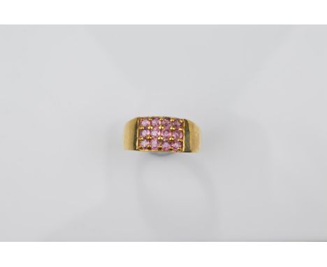 A certificated 9ct gold garnet gentleman's tablet ring, the rhodolite pink round cut stones in claw settings all in hallmarke