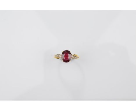 A certificated 18ct gold ruby and diamond dress ring, the oval mixed cut ruby in four claw setting with diamond set brilliant