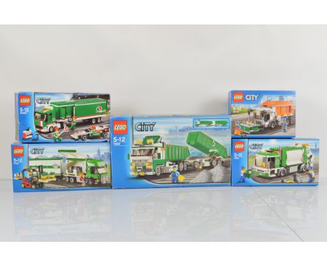Five boxed Lego City models, including Truck and Forklift 7733 unopened, Garbage Truck 60118 unopened, Heavy Hauler 7998 open
