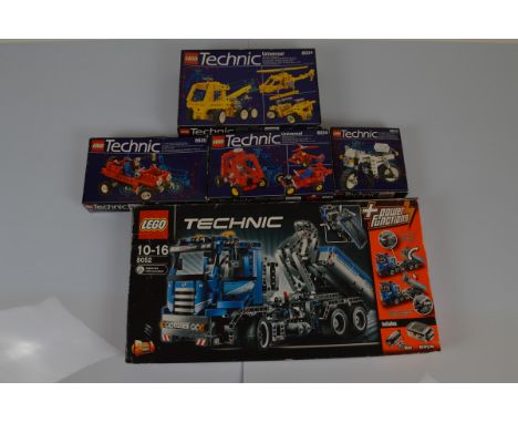 A collection of five boxed Lego Technic vehicles, including 8034 with manual , 8810 with manual , 8820 with manual , 8024 wit