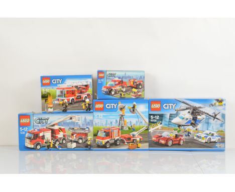 Five boxed Lego City models, including High Speed Chase 60138 unopened, Fire Ladder Truck 60107 unopened, Fire Utility Truck 