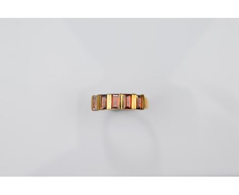 A certificated 9ct gold gentleman's garnet five stone dress ring, the Mozambique red garnets of baguette cut weighing approxi